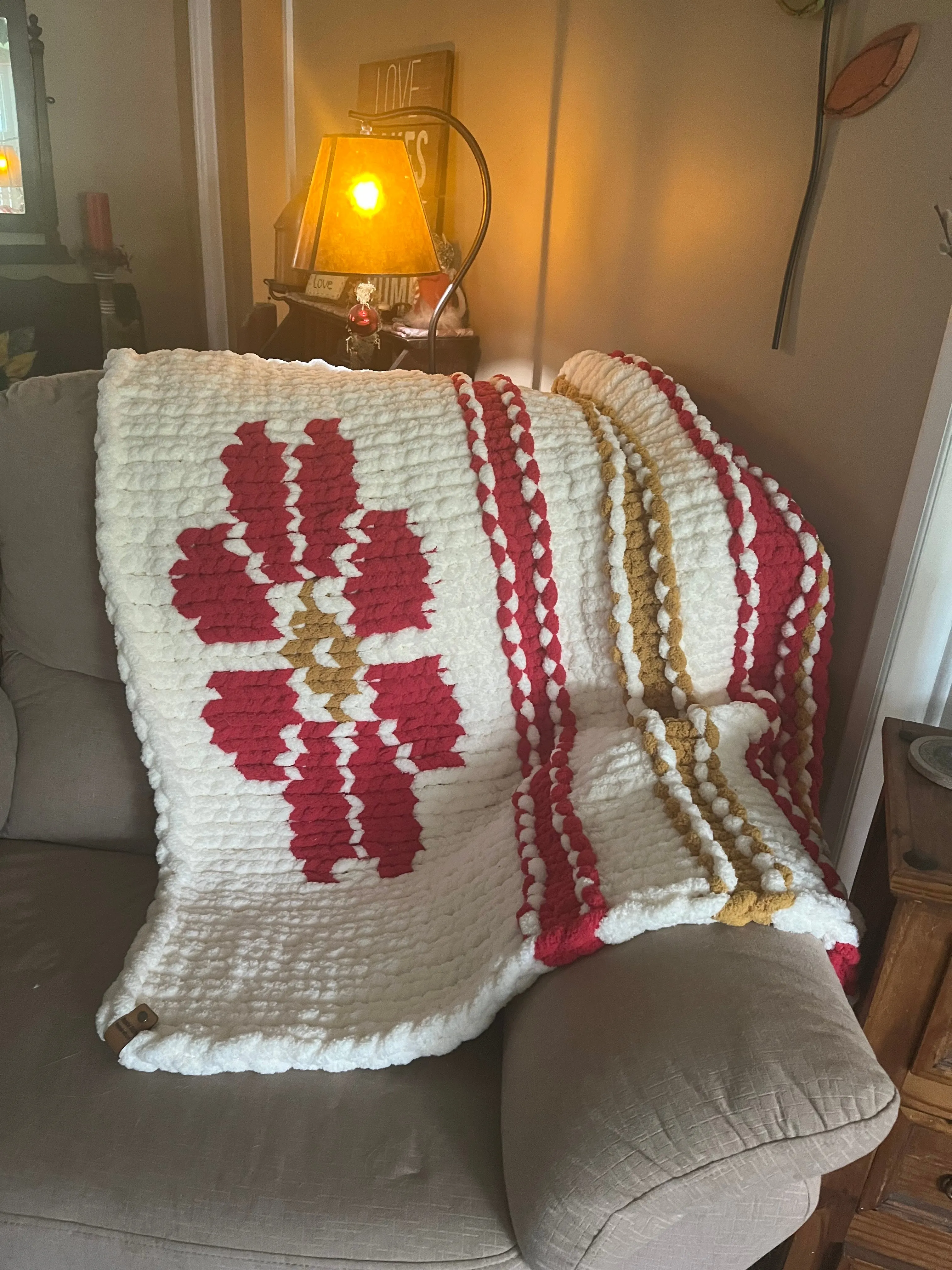 Hand Knit Sunburst Blanket (40x40): Embrace Warmth and Radiance
